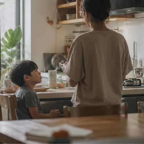 Child observing parent emotion at home