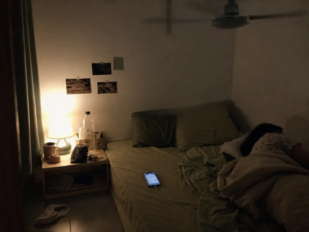 night bedroom with glowing phone